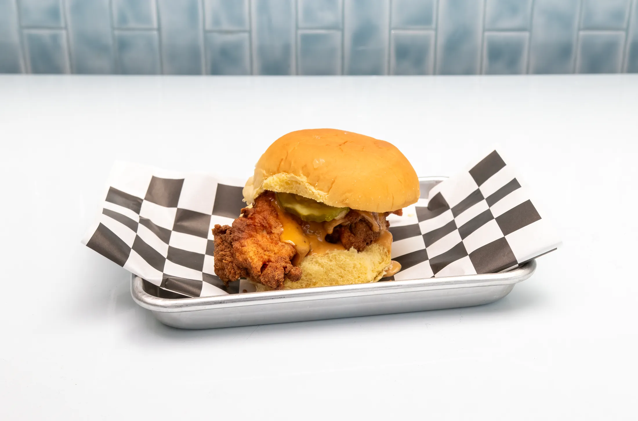 Rusty Combo Deal with The Rusty Classic, curly fries, and a drink at The Rusty Roost
